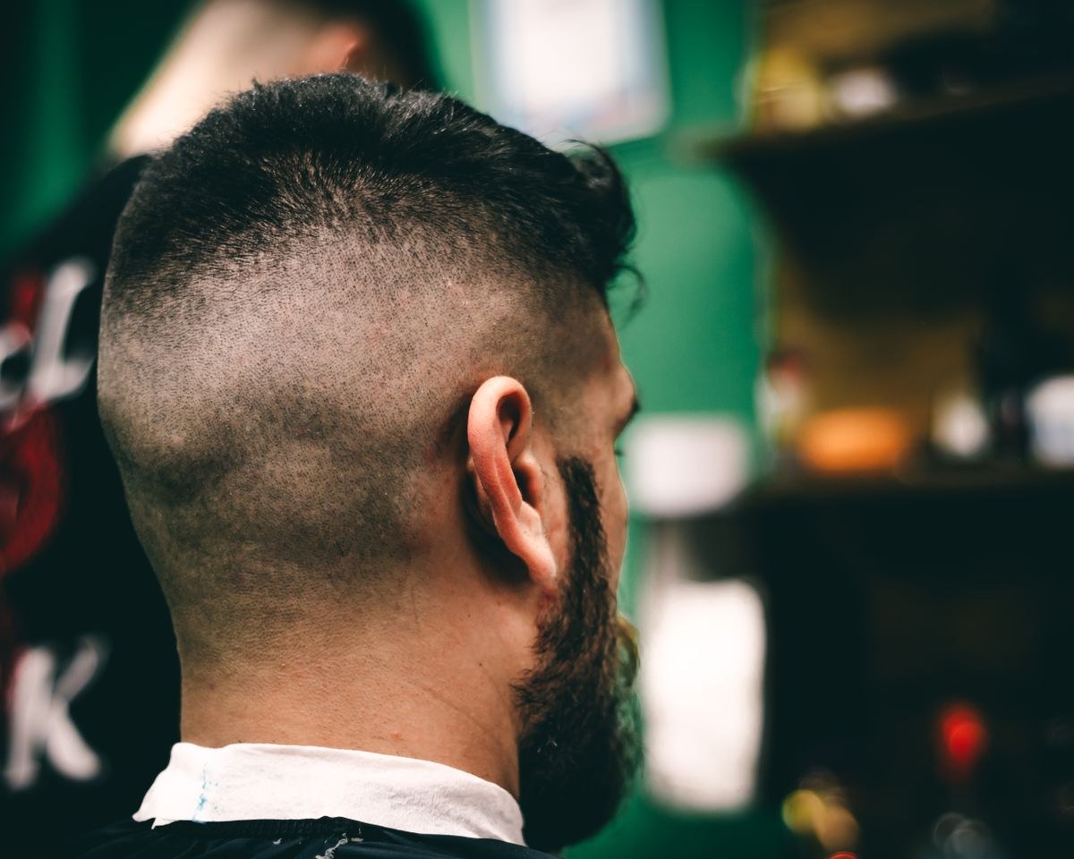 Close-up of a clean skin fade haircut with a sharp lineup