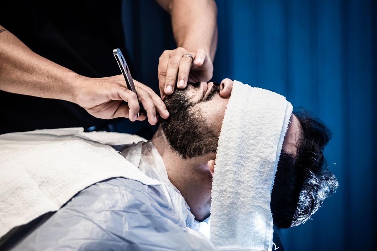 Hot towel treatment before a shave
